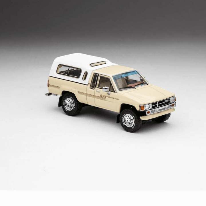 Toyota 1985 Hilux SR5 Xtracab Exclusive 1/64 Beige with Accessories