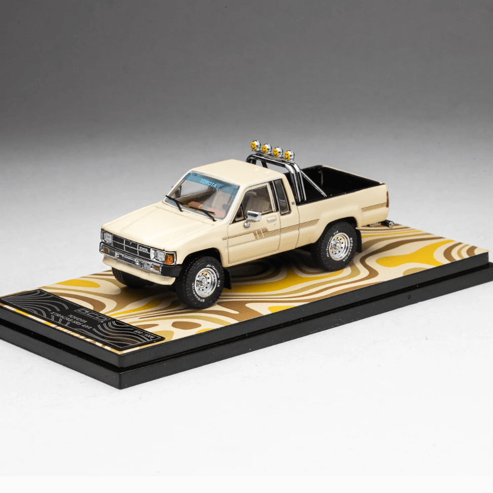 Toyota 1985 Hilux SR5 Xtracab Exclusive 1/64 Beige with Accessories