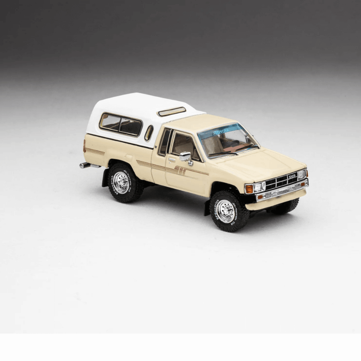 Toyota 1985 Hilux SR5 Xtracab Exclusive 1/64 Beige with Accessories